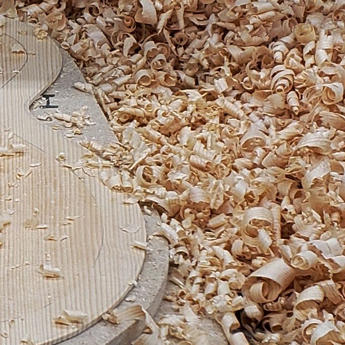 Spruce top carving